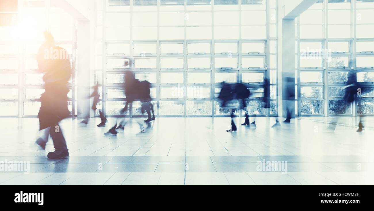 crowd of Blurred business people at a trade show Stock Photo - Alamy