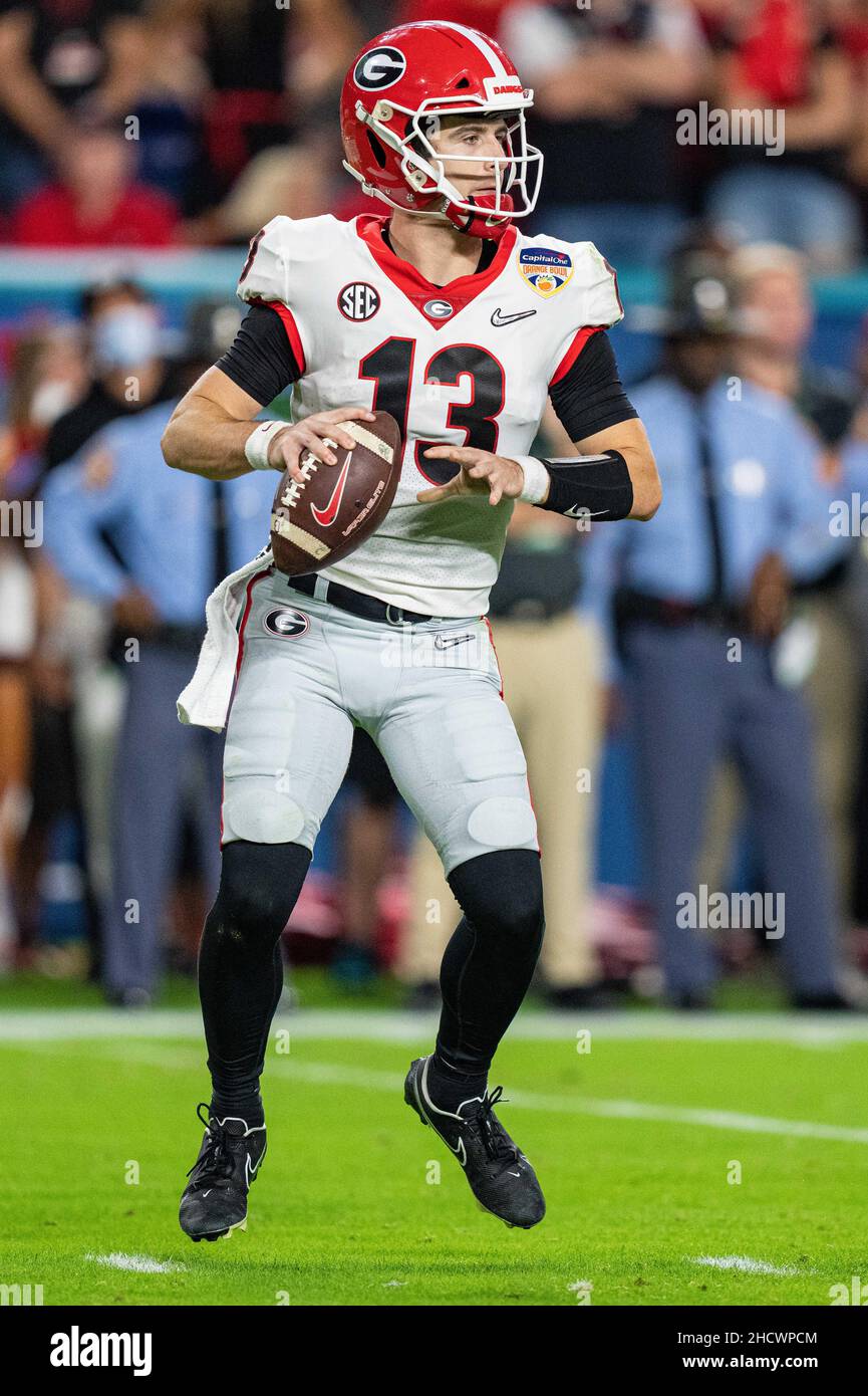 Georgia Bulldogs quarterback Stetson Bennett (13) plays during the Capital  One Orange Bowl NCAA College Football Playoff game between Georgia and  Michigan on Friday December 31, 2021 at Hard Rock Stadium in