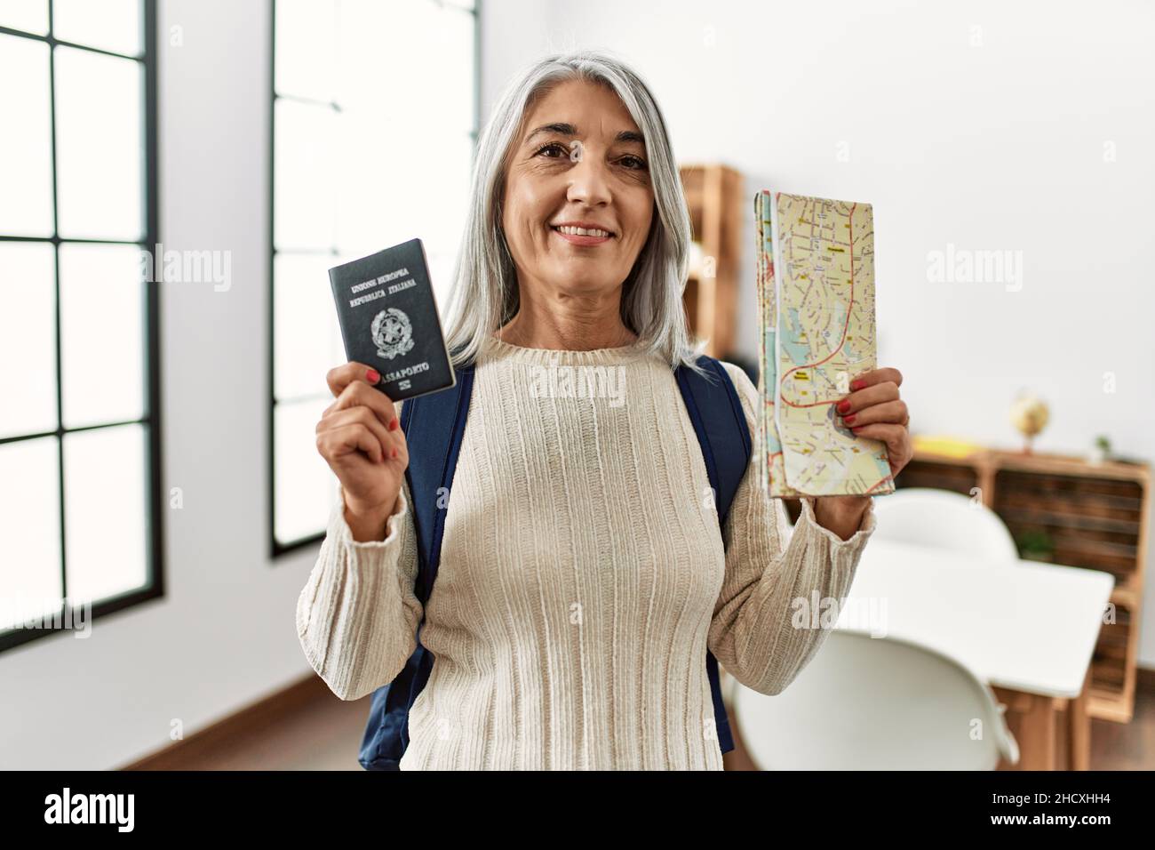 Mature woman passport map hi-res stock photography and images - Alamy