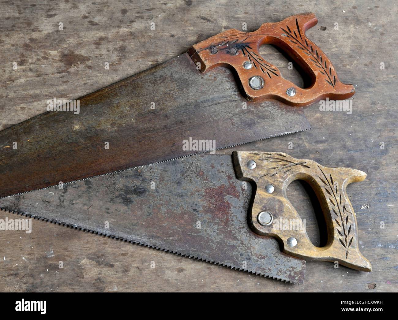 Vintage tools and handles with wood background Stock Photo
