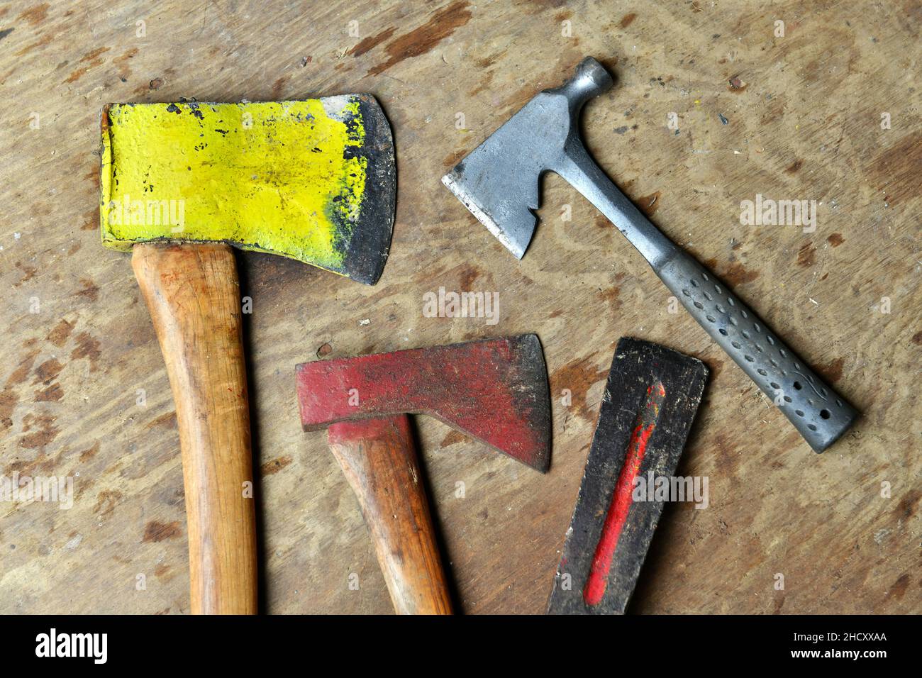 Vintage tools and handles with wood background Stock Photo - Alamy