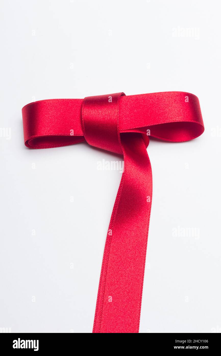 Wrapping Red Riboon Red ribbon for gift wrapping on a white background Stock Photo - Alamy