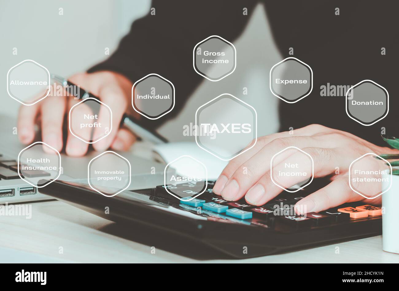 businessman uses calculator online Individual tax return form for paying taxes. business