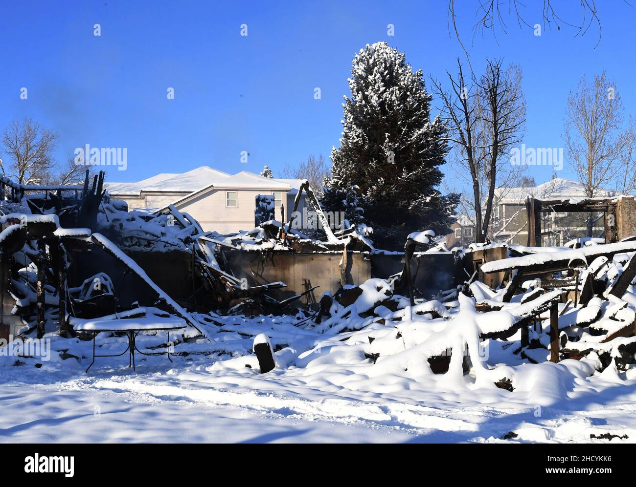 Superior, United States. 01st Jan, 2022. The remains of a house in Superior, Colorado continue to smolder on Saturday, January 1, 2022, after wildfires swept through the area the day before in this town 12 miles from Boulder. Nearly 1,000 homes were destroyed by wind-whipped wildfires before overnight snow extinguished the threat. Photo by Kate Grace/UPI Credit: UPI/Alamy Live News Stock Photo