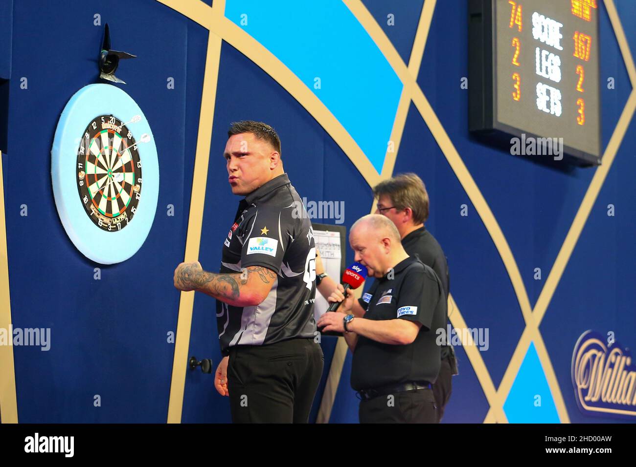 Michael Smith celebrates winning a set with a nine-darter during the final  of the Cazoo World Darts Championship at Alexandra Palace, London. Picture  date: Tuesday January 3, 2023 Stock Photo - Alamy