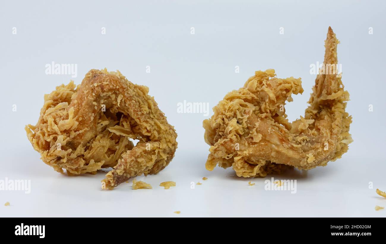 Crispy fried chicken wings isolated on white background Stock Photo - Alamy