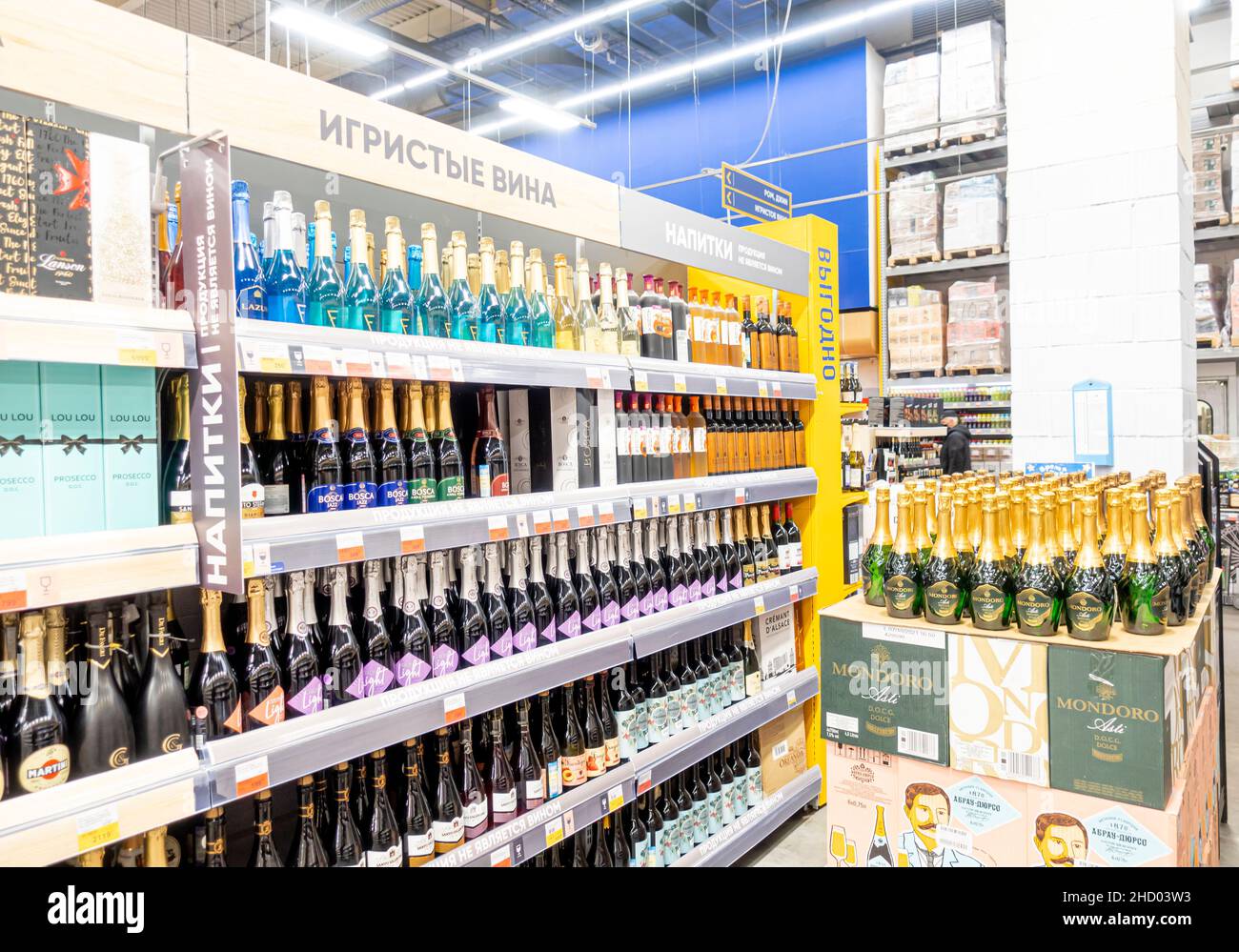 Shelves aisles with champagne sparkling wine alcohol liquor spirits, drinks on a shelf products overview in Lenta supermarket, St petersburg, Russia Stock Photo