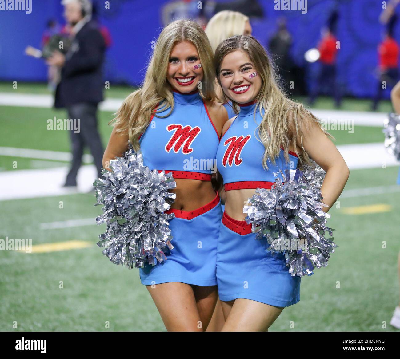 New Orleans, LA, USA. 1st Jan, 2022. Two Ole Miss cheerleaders pose for a picture during the 88th annual Allstate Sugar Bowl between the Ole Miss Rebels and the Baylor Bears at the Caesars Superdome in New Orleans, LA. Jonathan Mailhes/CSM/Alamy Live News Stock Photo