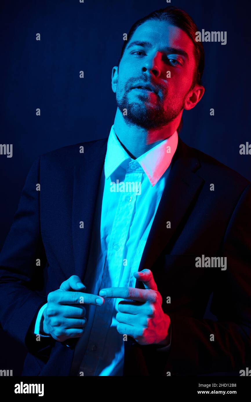 handsome man gestures with his hands attractive look lifestyle model