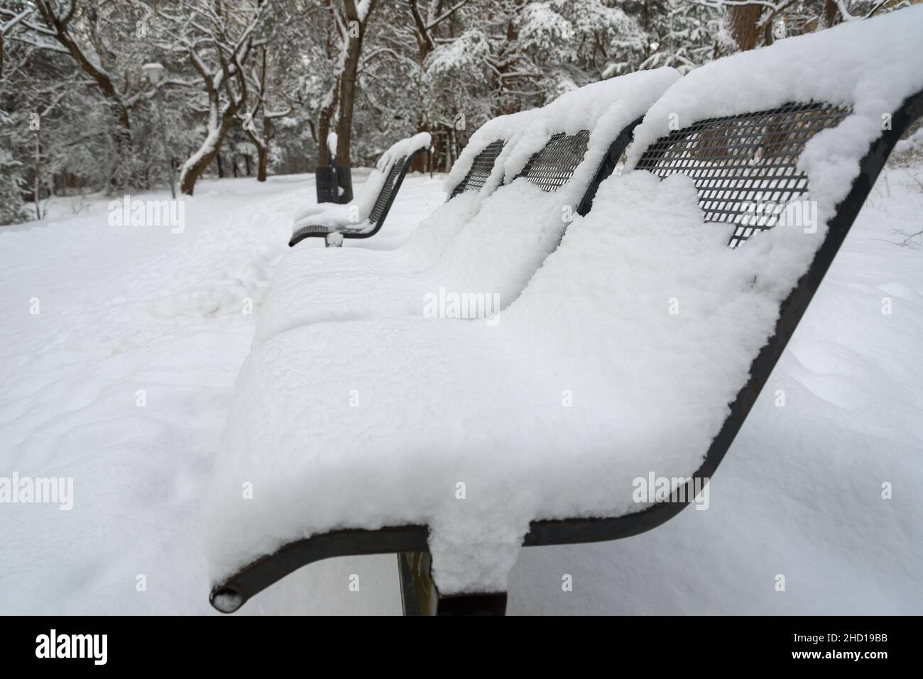 Alley benches in snowy city hi-res stock photography and images - Alamy