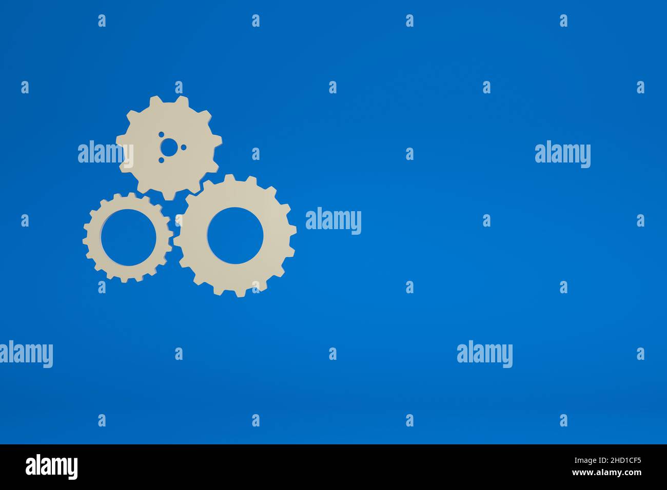 3D illustration of a gear on a blue background Stock Photo - Alamy
