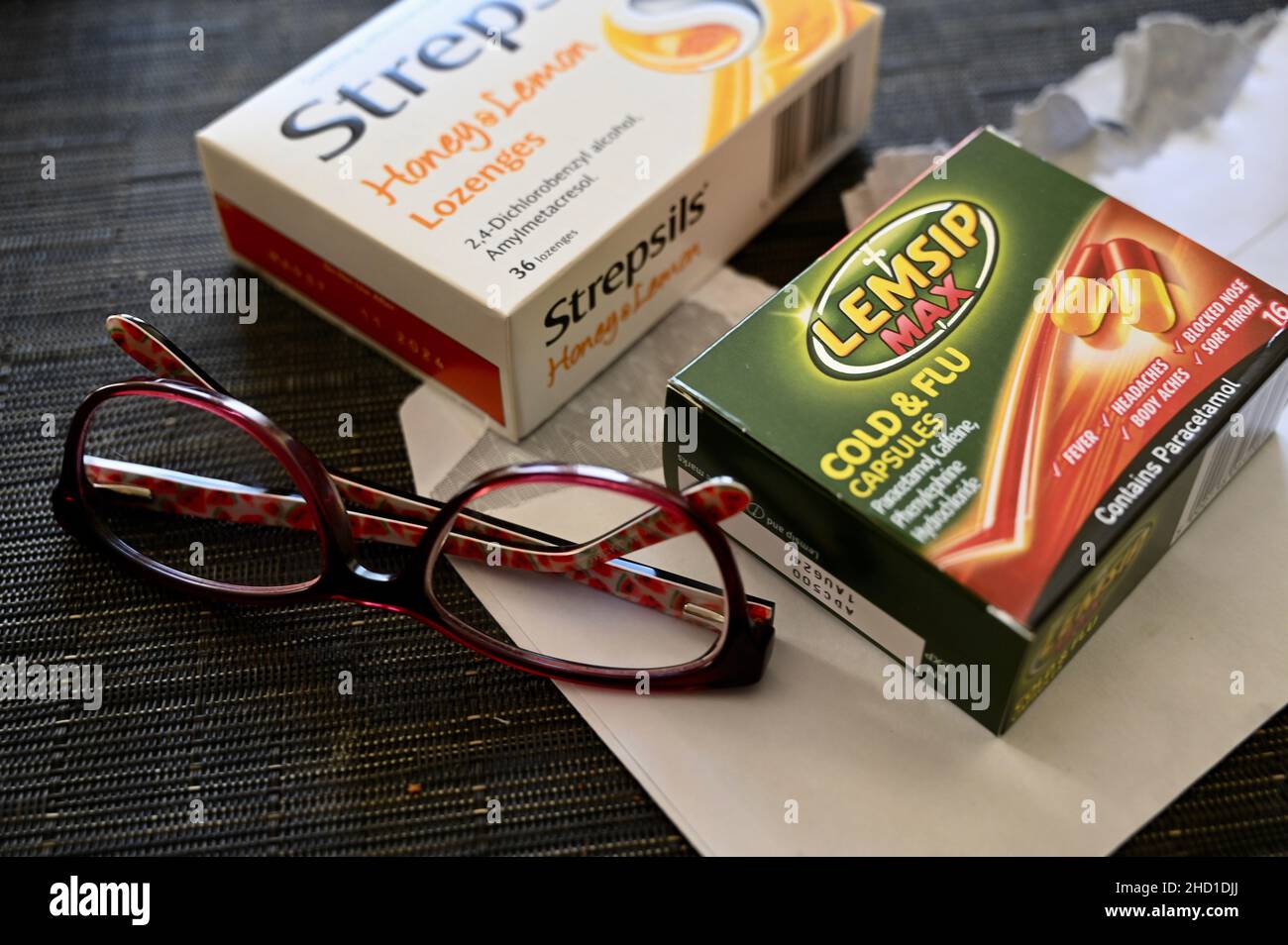 Medicine for sore throat colds and flu. Stock Photo
