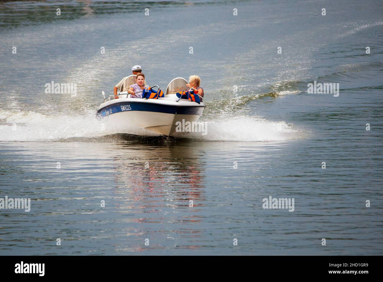 women on a pleasure boat ride in the breeze and have fun Stock Photo
