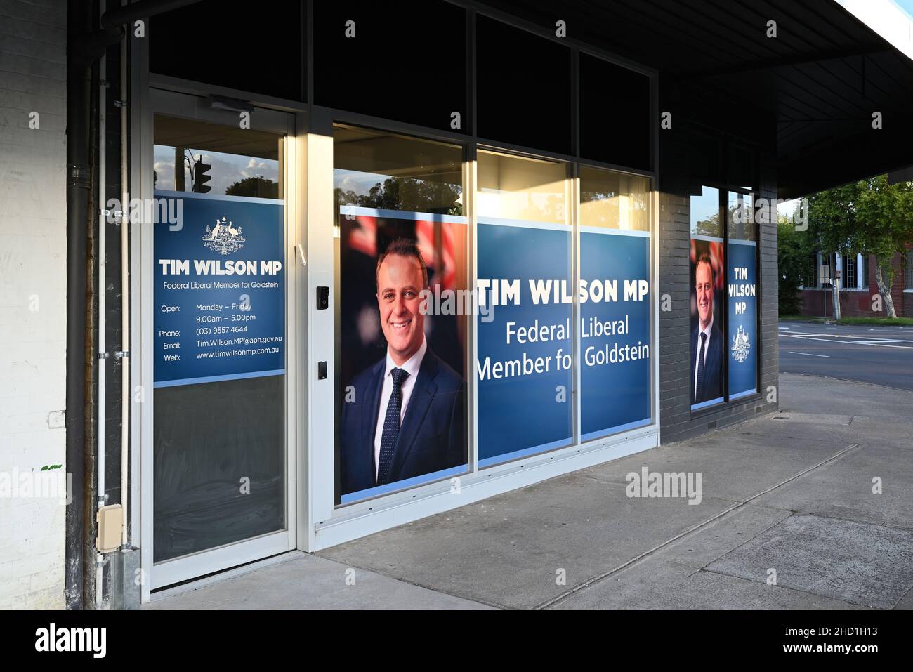 Entrance to the electorate office of Tim Wilson MP, member for Goldstein, with headshots prominently displayed on the windows Stock Photo
