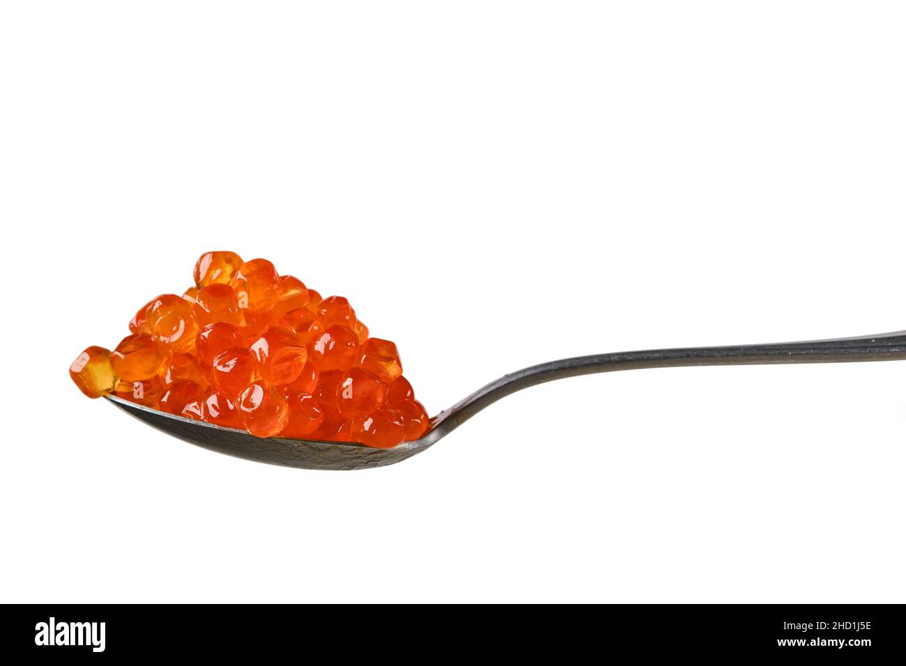 Spoon with salmon red caviar. Stock Photo