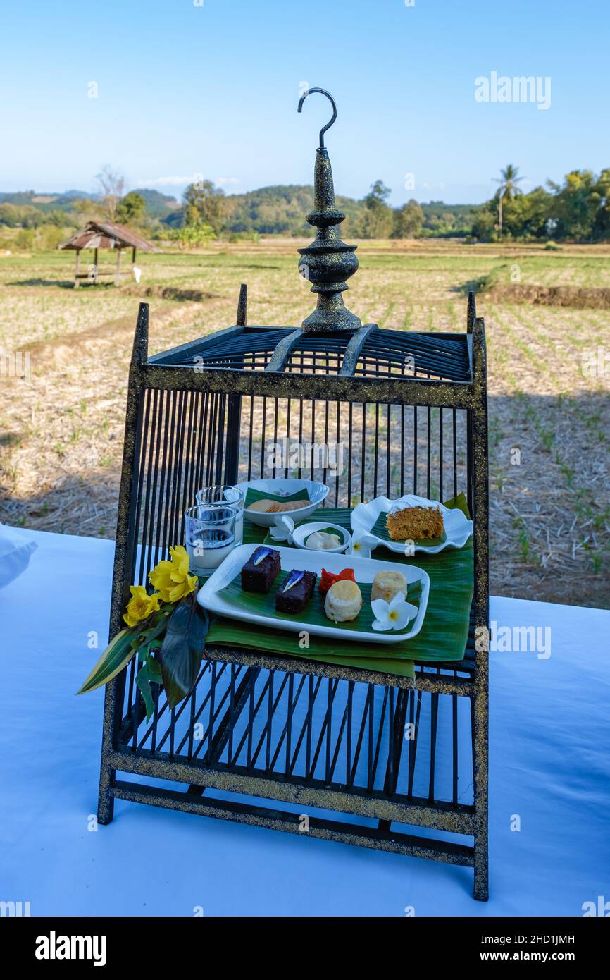 high tea with a look over the rice paddies countryside of Nan Thailand. beautiful rice field Nan Thailand Stock Photo