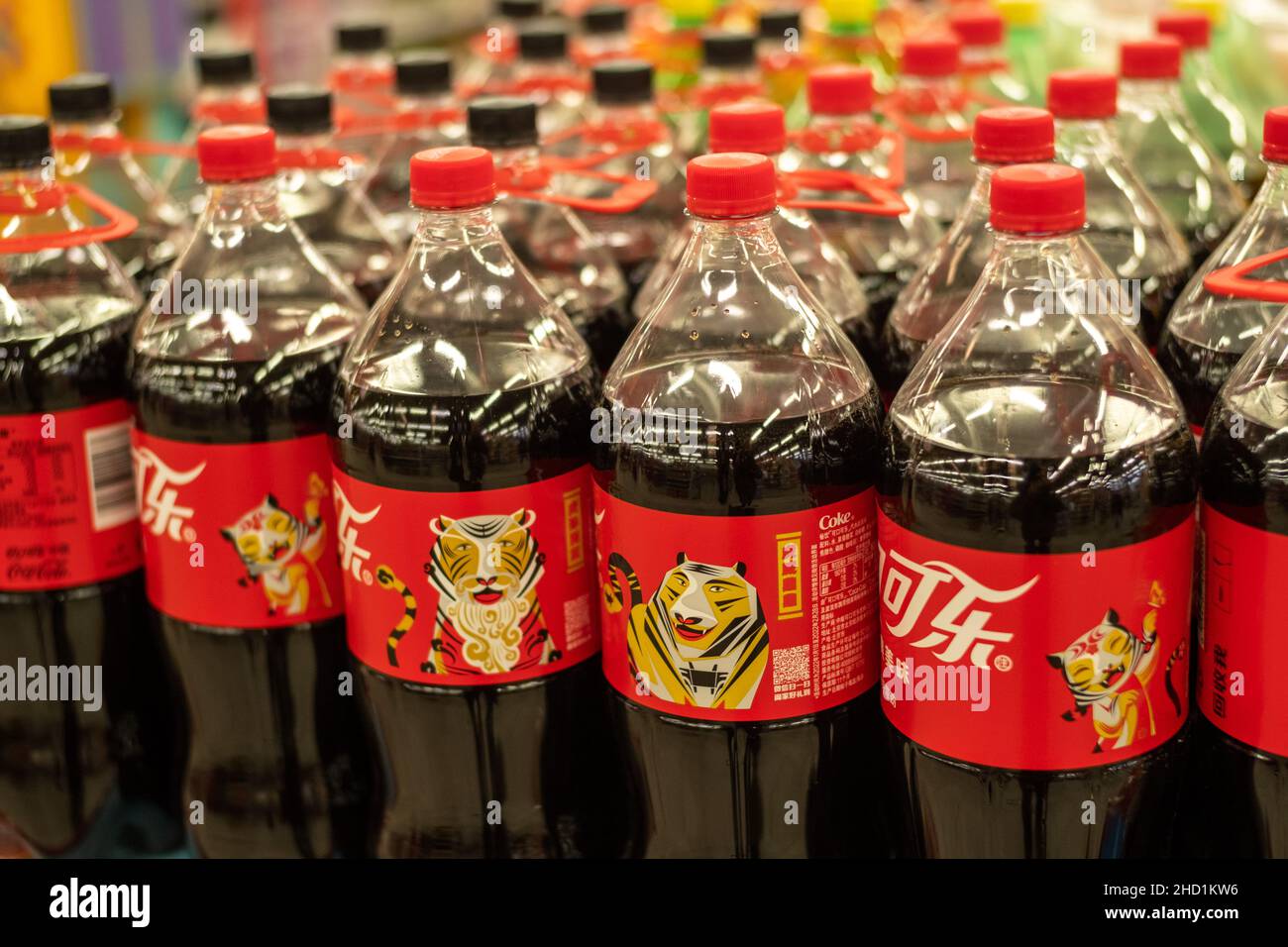Coca-Cola bottles for the Year of the Tiger are sold at a supermarket in Beijing, China. 02-Jan-2022 Stock Photo