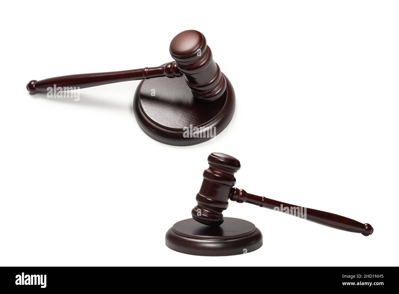 Wooden judge gavel and soundboard isolated on a white background. Justice of law system conceptual. Stock Photo