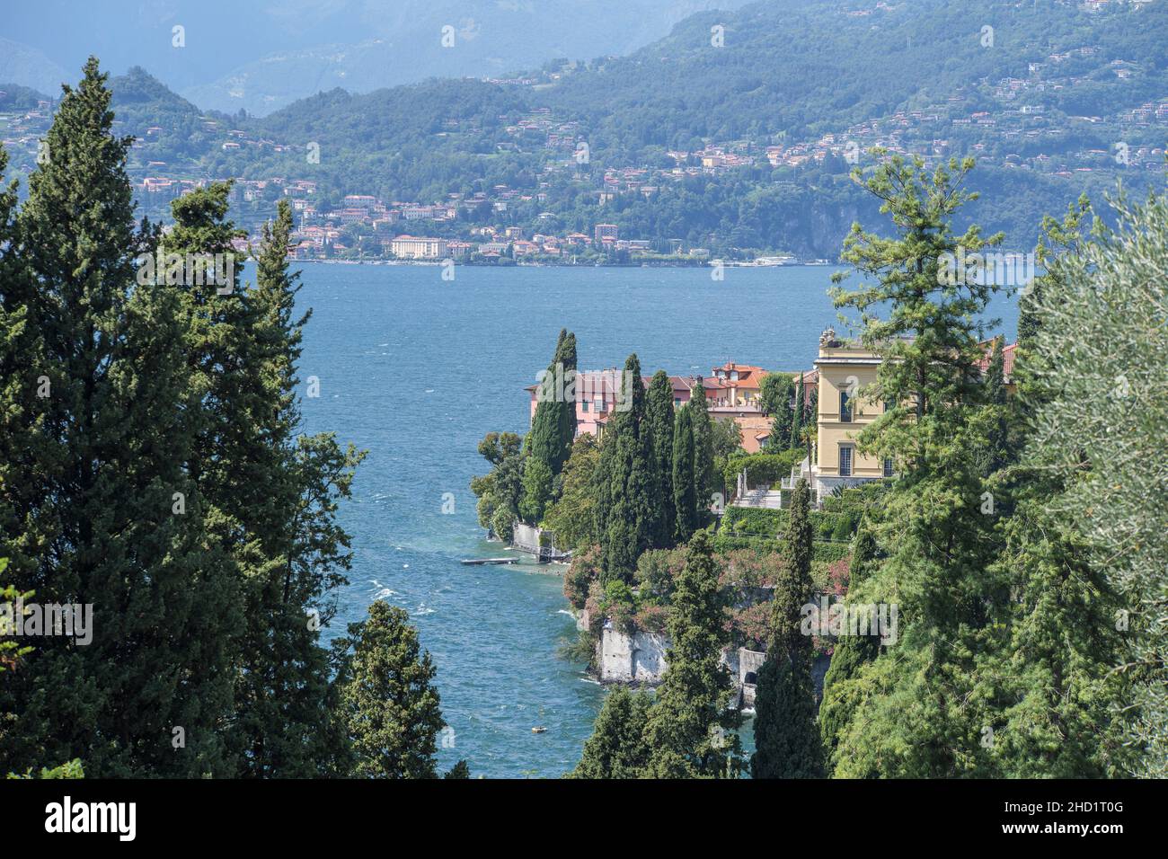 Scenic shoreline of Varenna on a sunny day at Lago di Como in Italy Stock Photo