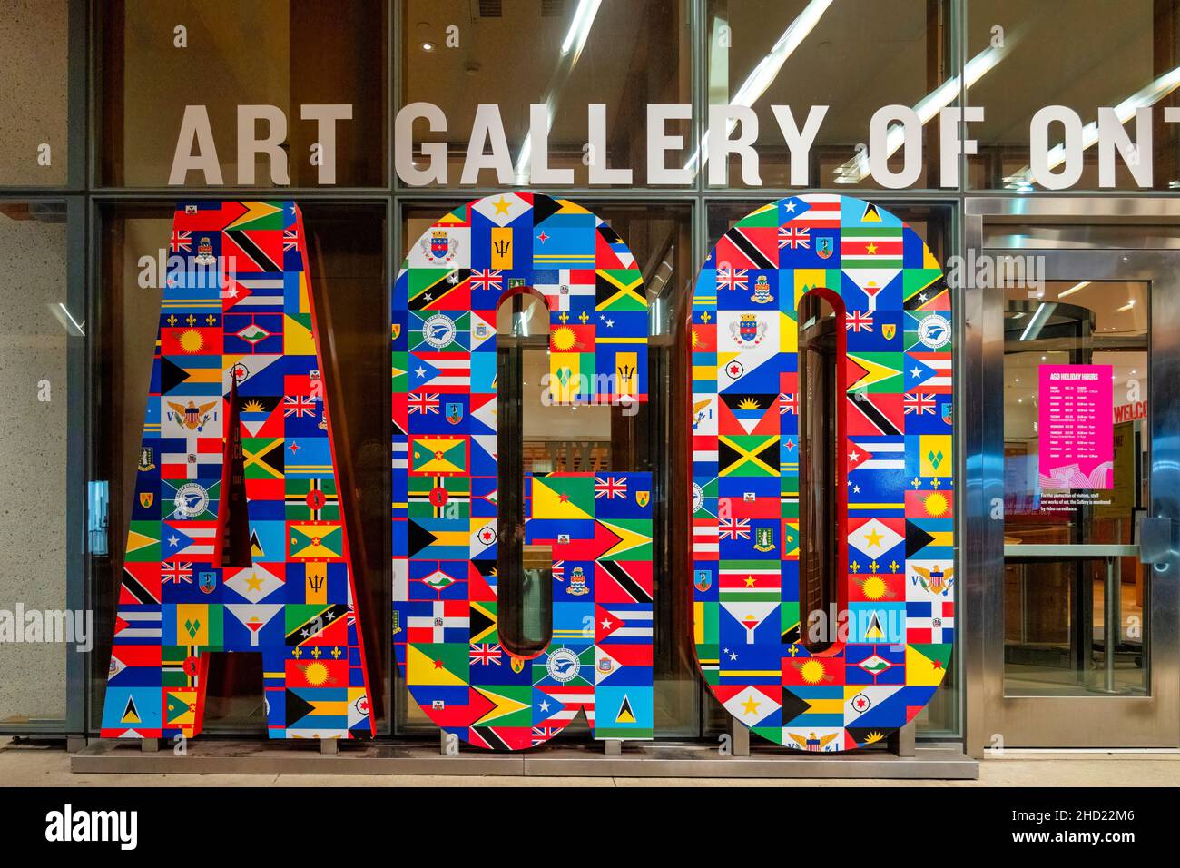 Sign for the Art Gallery of Ontario or AGO. The new design has diverse national flags covering the letters. Jan. 2, 2022 Stock Photo