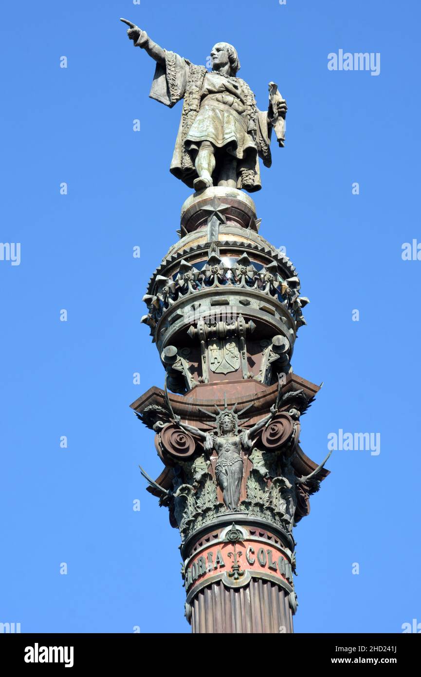 Spain, Barcelona, in the center of the square Portal de la Pau stand a column 60 meters hight with in this top the statue of Christopher Colombus. Stock Photo