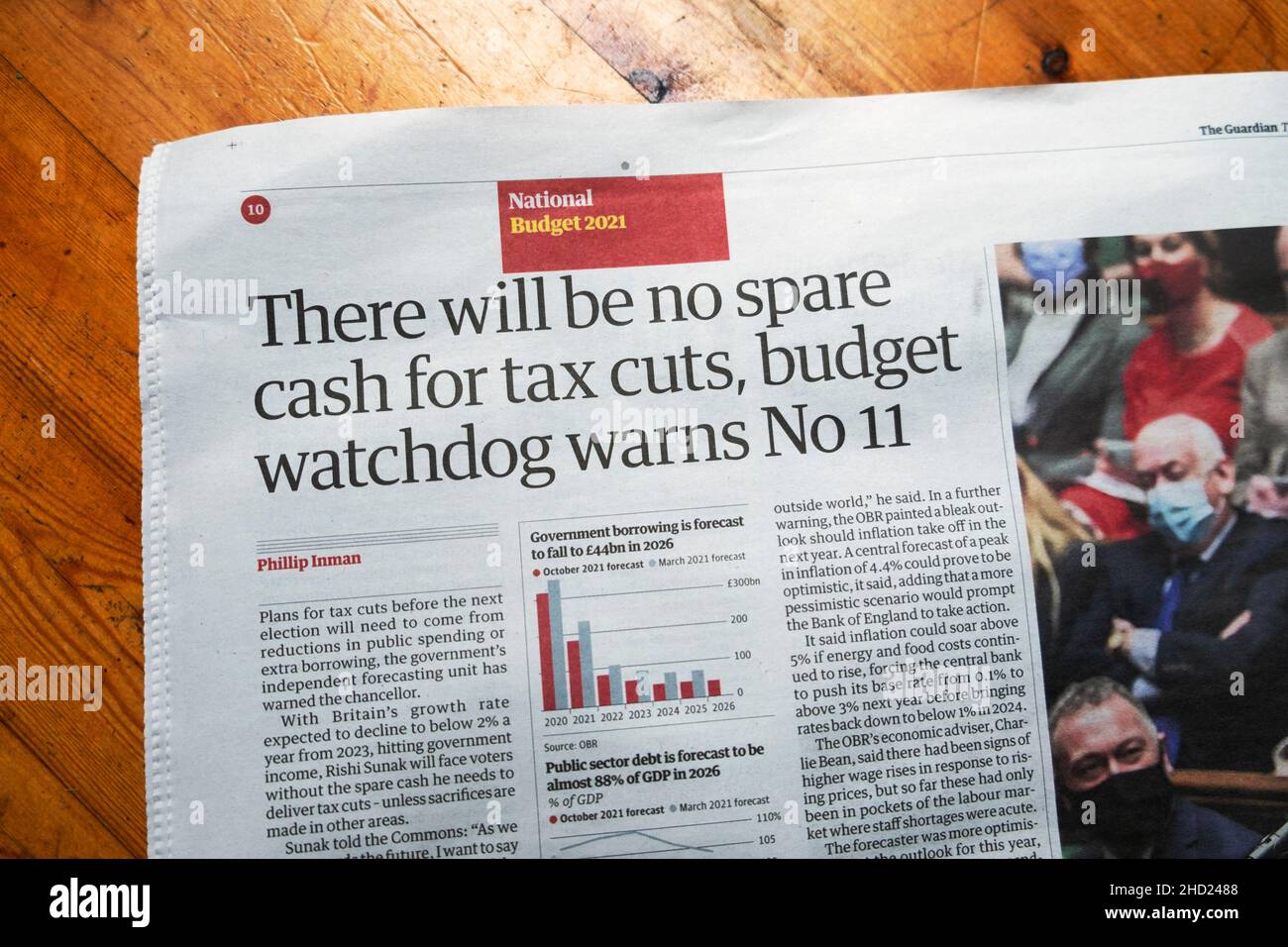 'There will be no spare cash for tax cuts, budget watchdog warns No11' 2021 Budget Guardian newspaper headline article clipping London UK Stock Photo