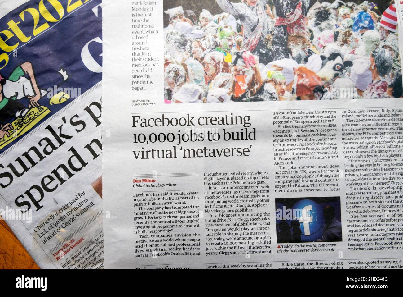 "Facebook creating 10,000 jobs to build virtual 'metaverse' " Guardian newspaper headline Facebook article clipping on 18 October 2021 in London UK Stock Photo