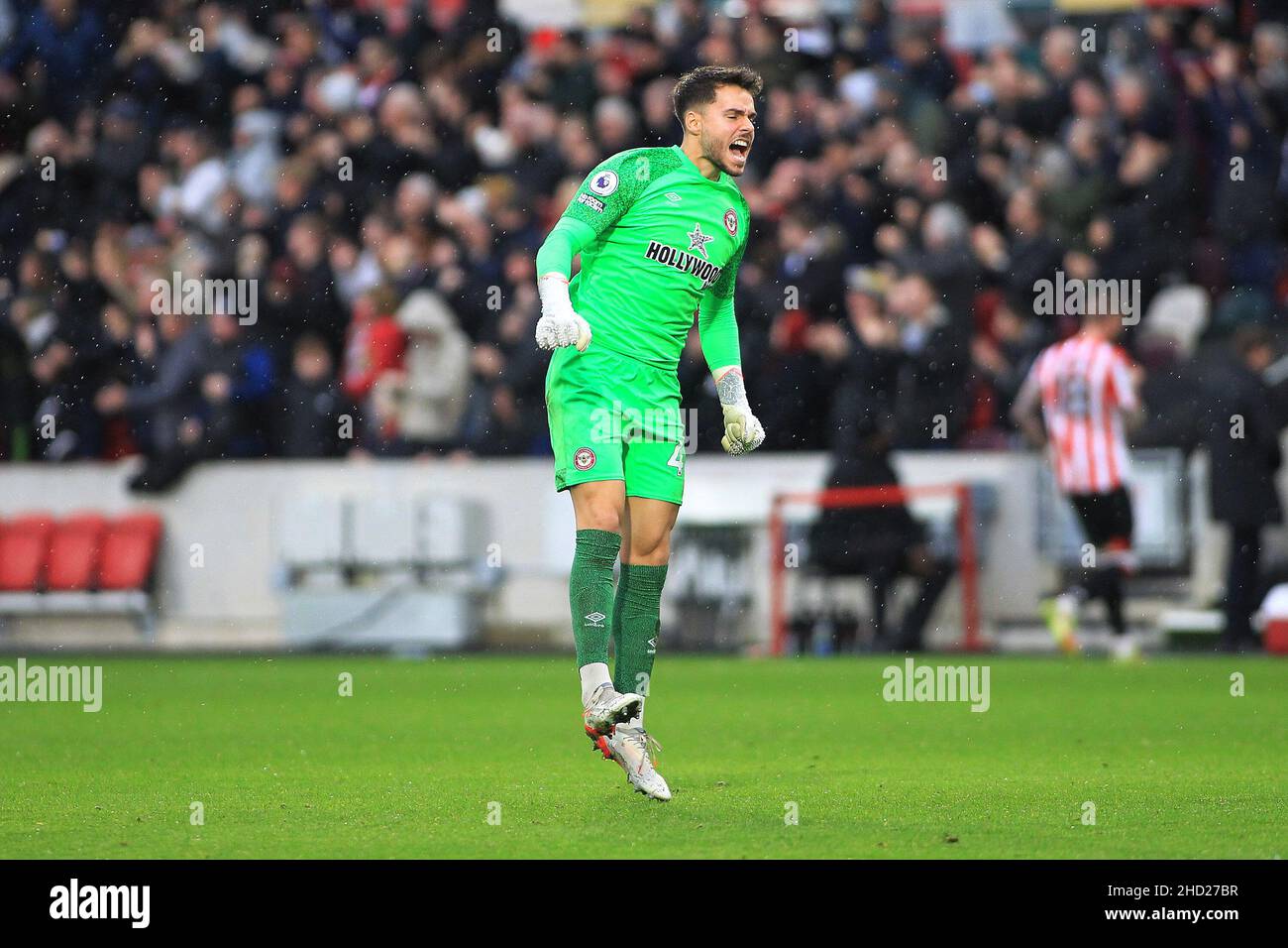 London, UK. 02nd Jan, 2022. Alvaro Fernandez, the goalkeeper of Brentford celebrates after Yoane Wissa of Brentford scores his teams first goal. Premier league match, Brentford v Aston Villa at the Brentford Community Stadium in Brentford, London on Sunday 2nd January 2022. this image may only be used for Editorial purposes. Editorial use only, license required for commercial use. No use in betting, games or a single club/league/player publications. pic by Steffan Bowen/Andrew Orchard sports photography/Alamy Live news Credit: Andrew Orchard sports photography/Alamy Live News Stock Photo