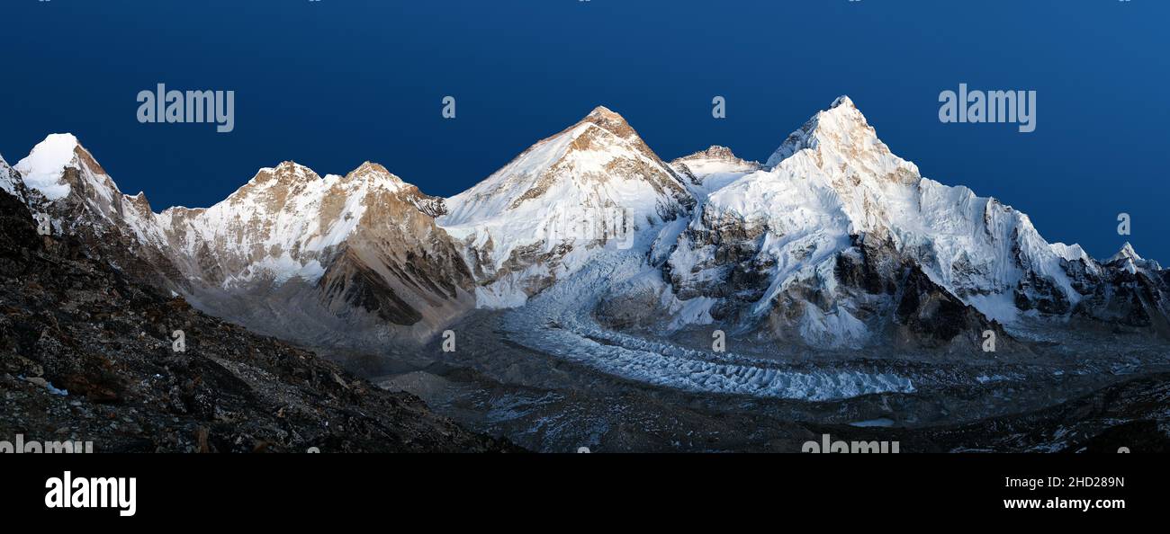 nightly view of Mount Everest isolated on blue sky background, Lhotse and Nuptse from mount Pumo Ri base camp , Nepal Himalayas mountains Stock Photo