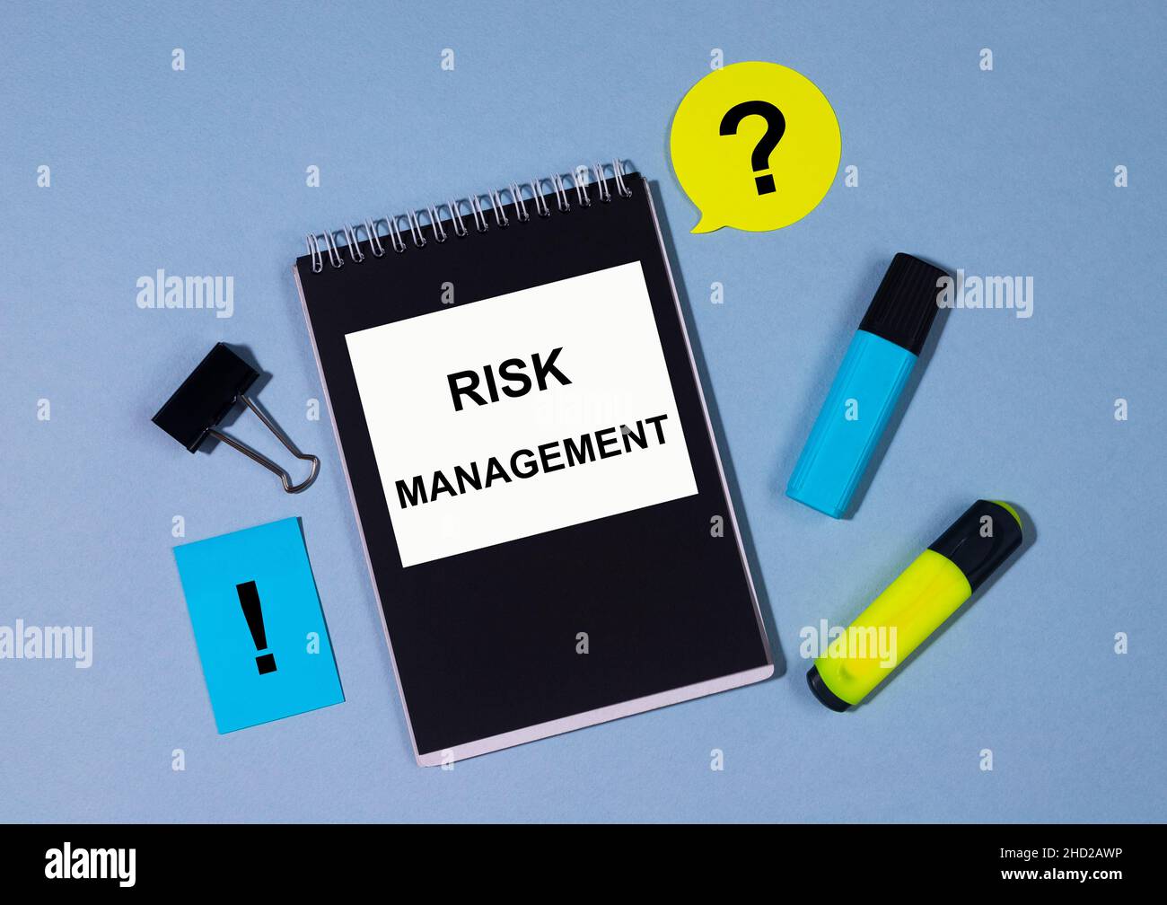 Risk management memo written on a notebook with pencil memo notes and ...