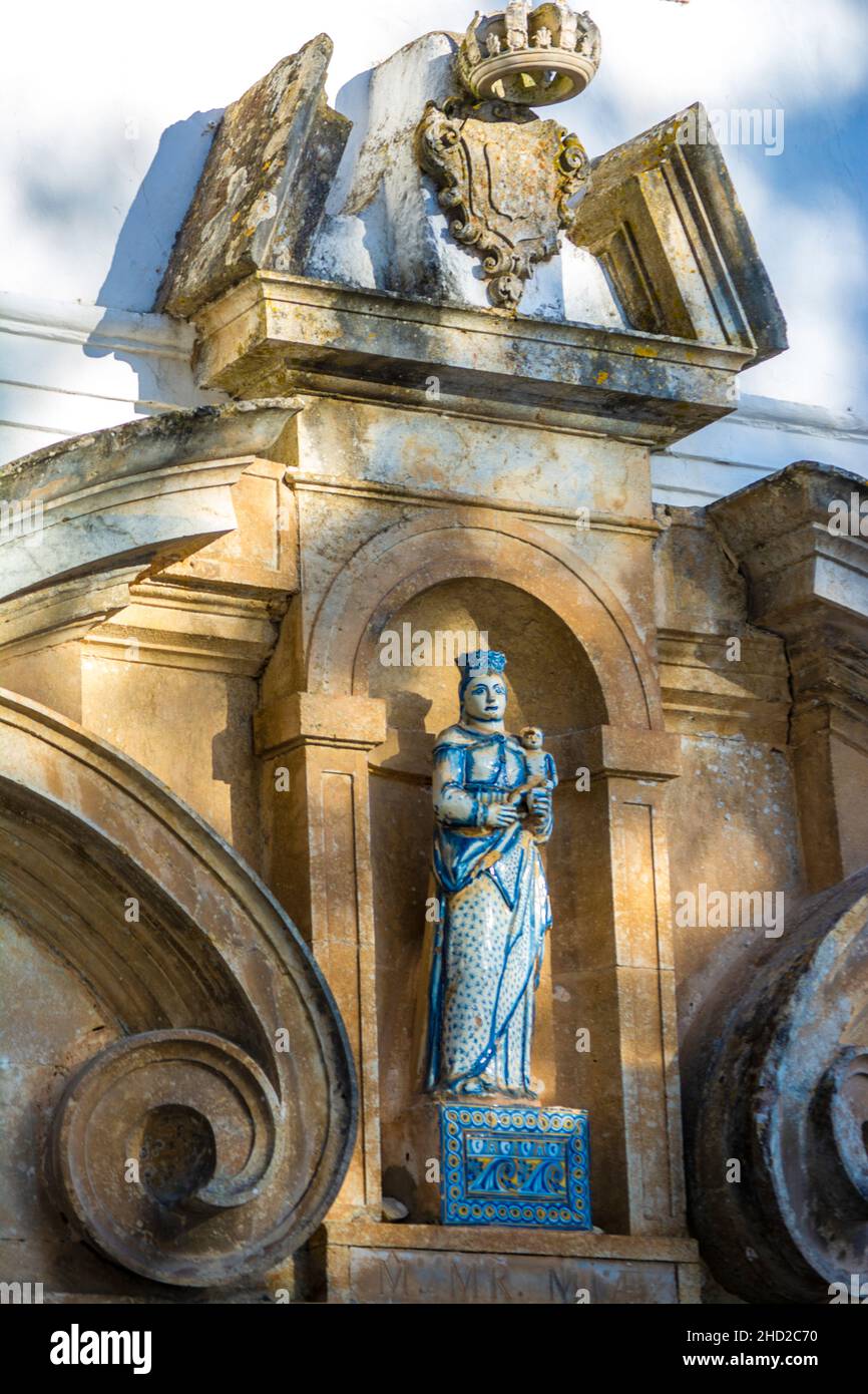 Statue of the Virgin and Child on the portal of Igreja da Misericórdia, Óbidos, Portugal, dating from 1666. Stock Photo
