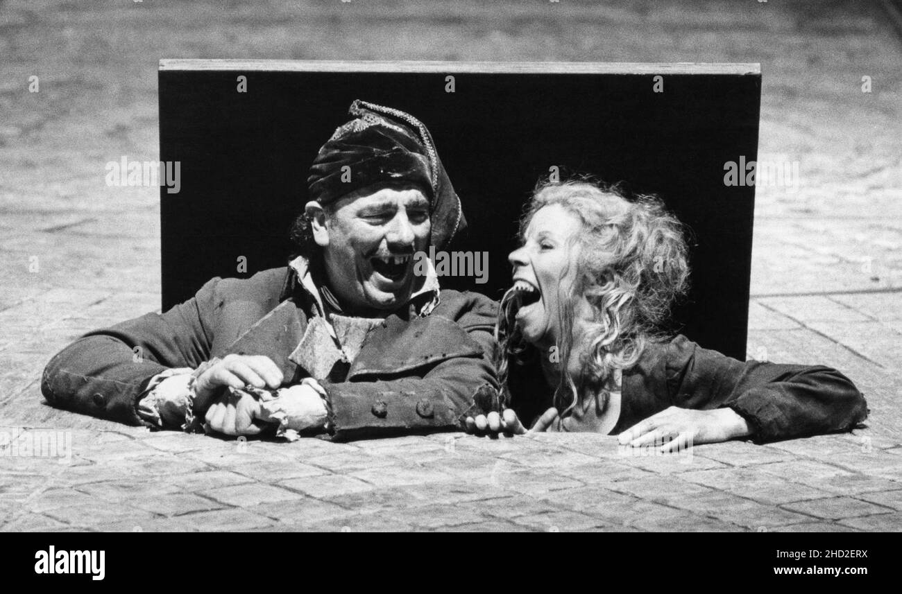 original London cast - Alun Armstrong (Thenadier), Sue Jane Tanner (Madame Thenadier) in LES MISERABLES at the Barbican Theatre, London EC2  08/10/1985   music: Claude-Michel Schonberg  text: Herbert Kretzmer  original text by Alain Boubil & Jean-Marc Natel   additional material: James Fenton  based on the novel by Victor Hugo  adapted & directed by Trevor Nunn & John Caird  set design: John Napier  costumes: Andreane Neofitou  lighting: David Hersey  a Royal Shakespeare Company (RSC) & Cameron Mackintosh co-production   transferred to the Palace Theatre, London W1 04/12/1985-2004   transferre Stock Photo
