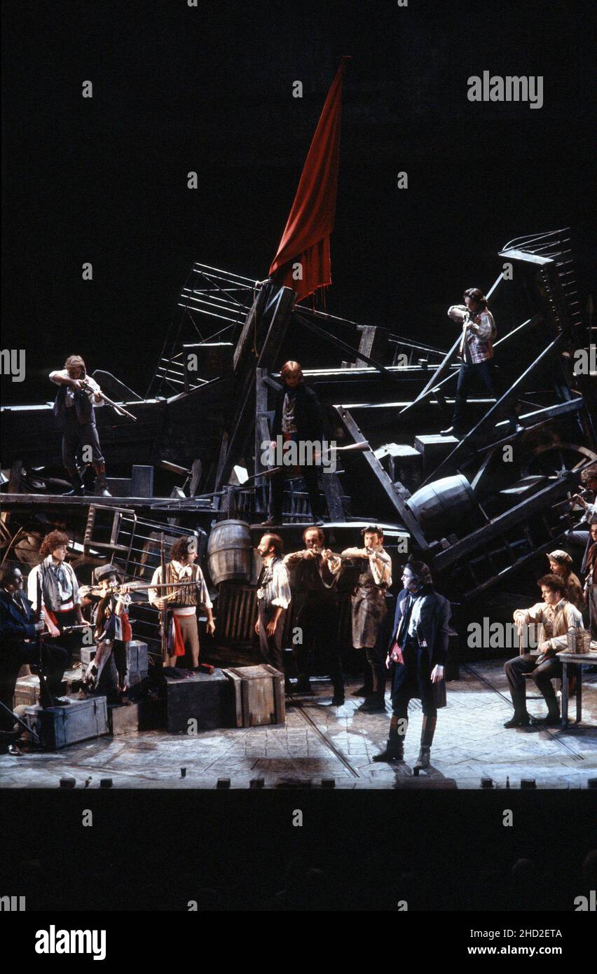 original London cast - revolutionaries at the barricades with (downstage front right) Roger Allam (Javert) in LES MISERABLES at the Barbican Theatre, London EC2 08/10/1985   music: Claude-Michel Schonberg  text: Herbert Kretzmer  original text by Alain Boubil & Jean-Marc Natel   additional material: James Fenton  based on the novel by Victor Hugo  adapted & directed by Trevor Nunn & John Caird  set design: John Napier  costumes: Andreane Neofitou  lighting: David Hersey  a Royal Shakespeare Company (RSC) & Cameron Mackintosh co-production   transferred to the Palace Theatre, London W1 04/12/19 Stock Photo