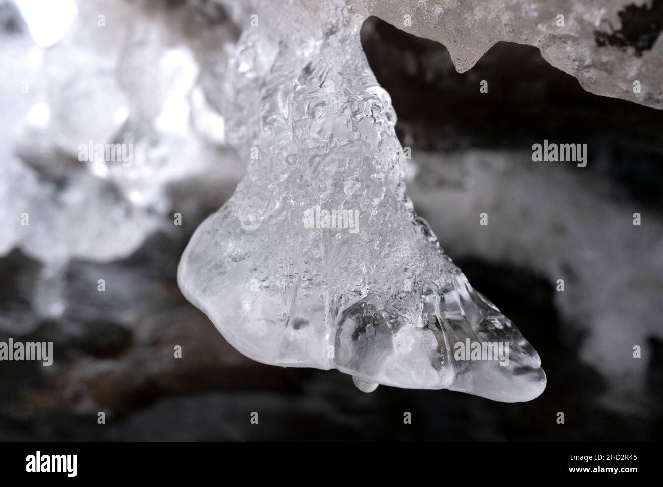 Icicle formed on Lacupite river in closeup Stock Photo Alamy