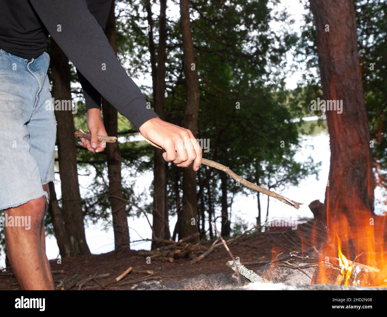 Cooking over campfire Stock Photo Alamy