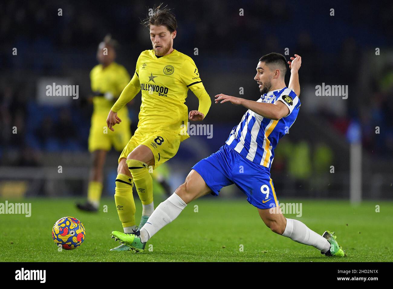 Neal Maupay of Brighton & Hove Albion and Mathias Jensen of Brentford - Brighton & Hove Albion v Brentford, Premier League, Amex Stadium, Brighton, UK - 26th December 2021  Editorial Use Only - DataCo restrictions apply Stock Photo