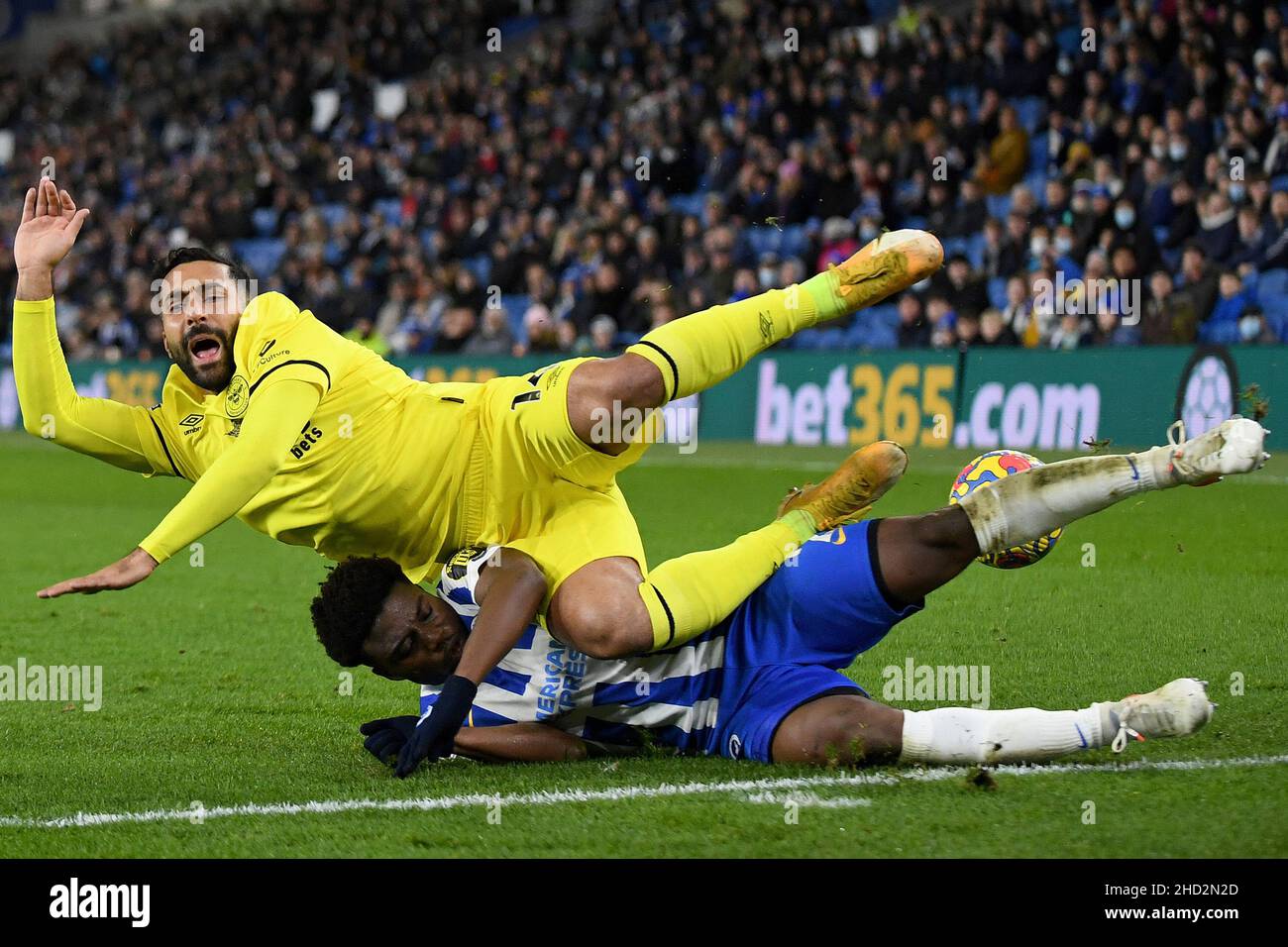 Tariq Lamptey of Brighton & Hove Albion tackles Saman Ghoddos of Brentford Brighton & Hove Tariq Lamptey of Brighton & Hove Albion tackles Saman Ghoddos of Brentford Brighton & Hove
