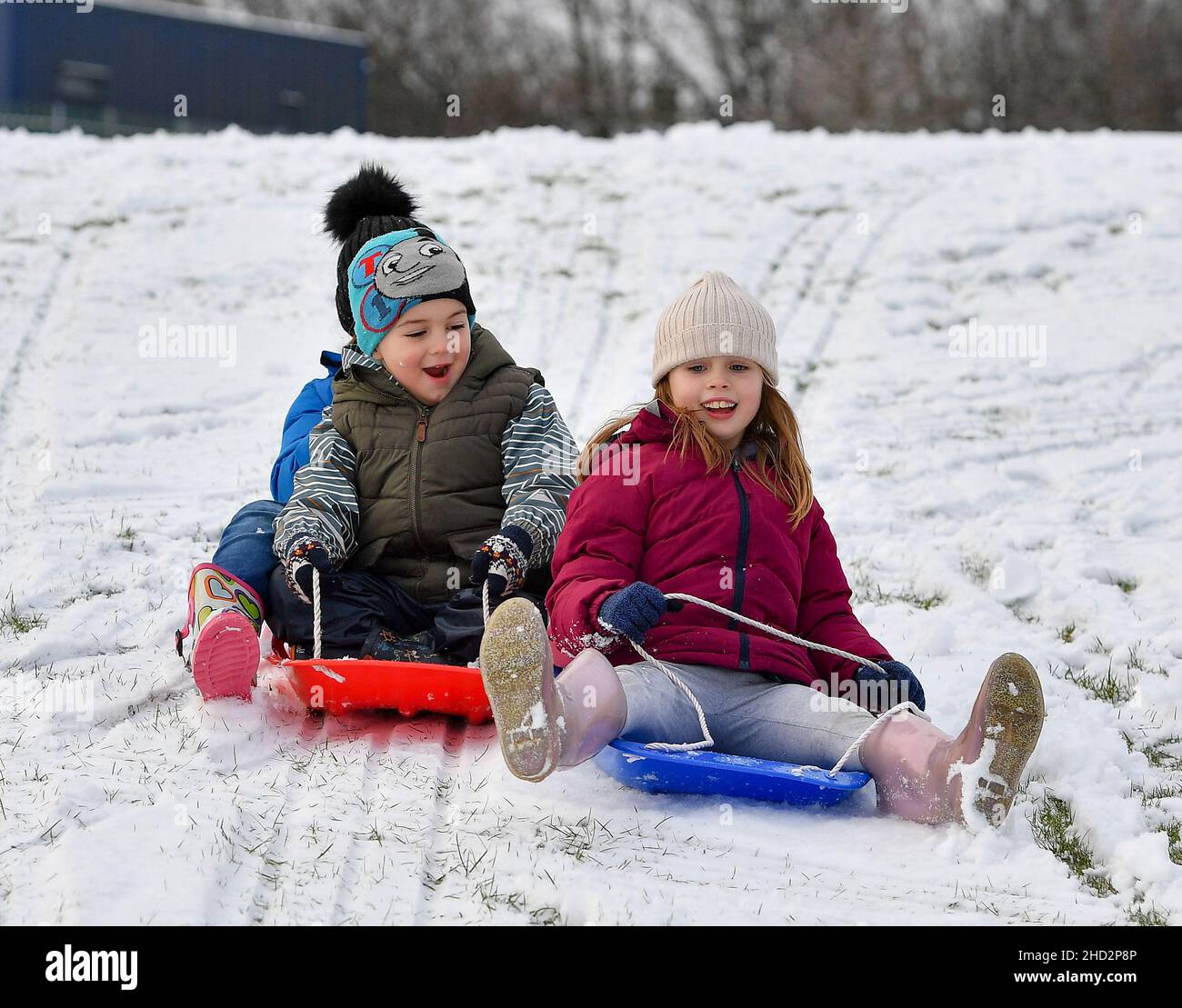 Pictured: Kerry Anne McBeth( 7) and Pedro Alexiou-Carrico (4) from Armadale have some fun in the snow.  The first falls of snow in central Scotland meant fun in the snow for kids in Armadale, West Lothian.  (c) Dave Johnston Stock Photo