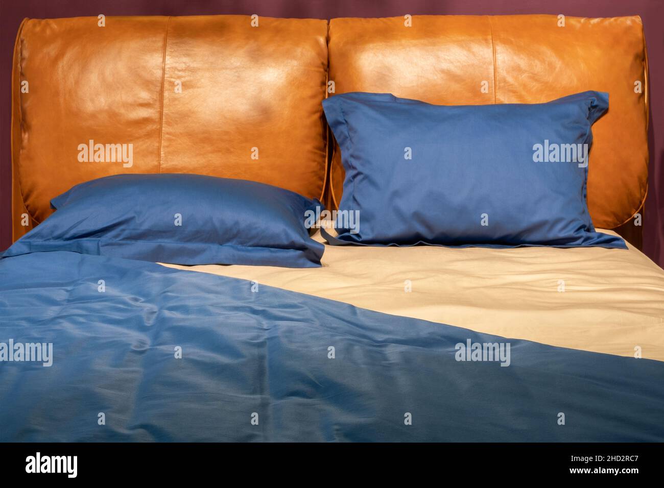 Big comfortable bed in hotel room Stock Photo Alamy
