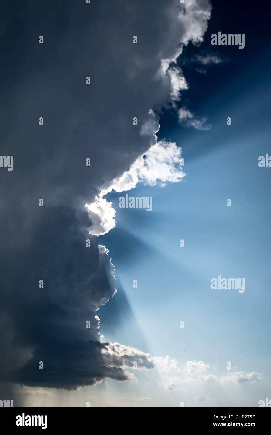 Rays burst through storm hi-res stock photography and images - Alamy
