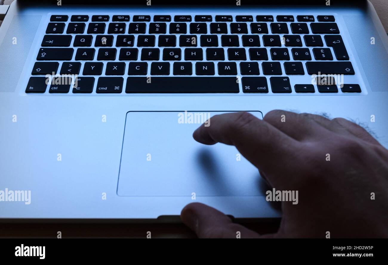 Apple Macbook Pro, using the touchpad with one finger Stock Photo Alamy