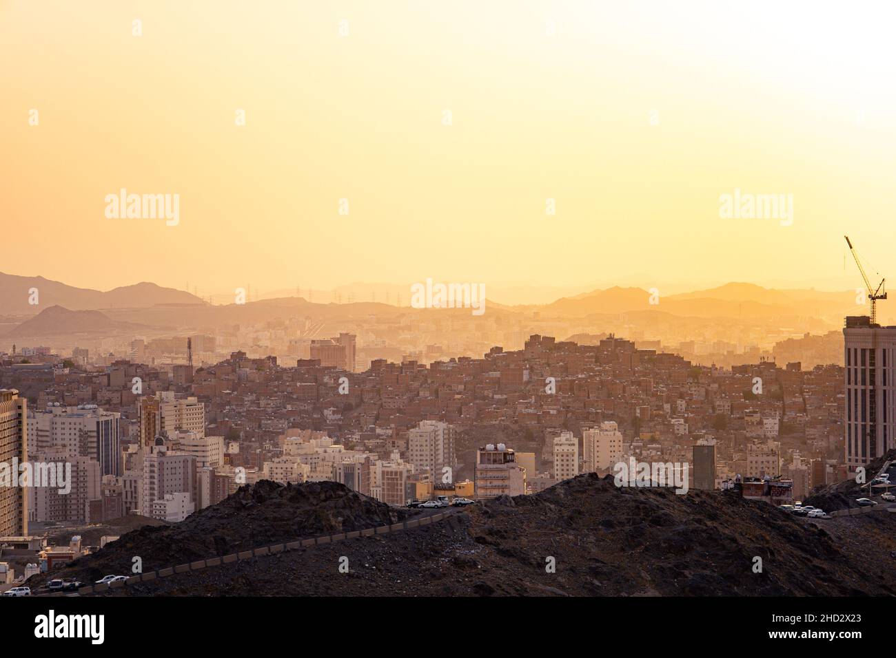 Mecca city urban and Buildings , Saudi Arabia at sunset - Makkah al-Mukarramah مدينة مكة المكرمة - التوسعة - الحج Stock Photo