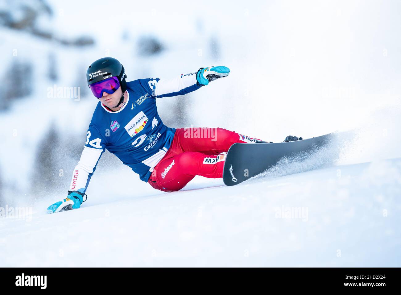 GALMARINI Nevin (SUI) competing in the Fis Snowboard World Cup 2022 Men's Parallel Giant Slalom on the Pra Di Tori (Carezza) Course. Stock Photo