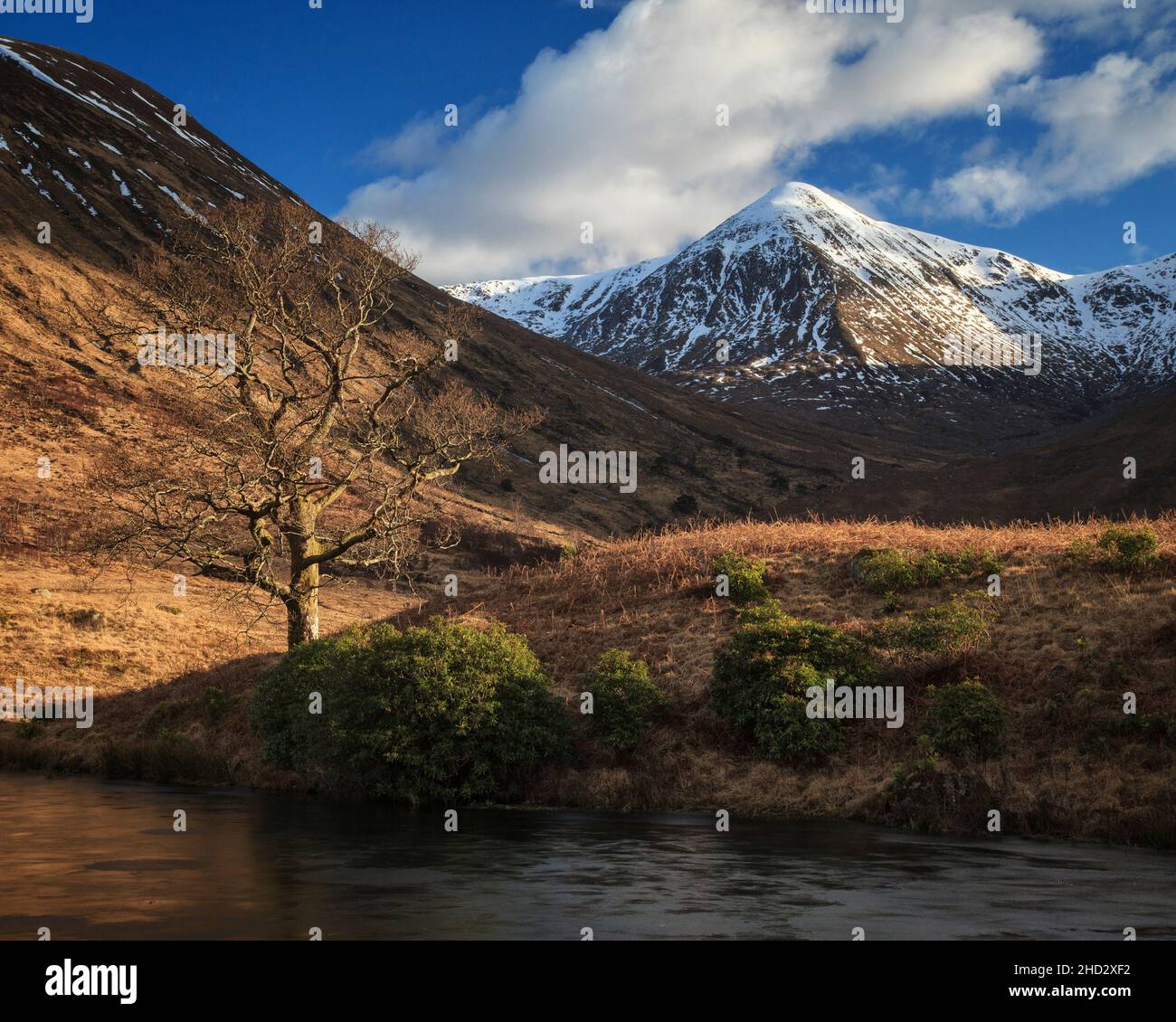 Snow-capped mountains of Glen Etive in winter in the Highlands of Scotland Stock Photo