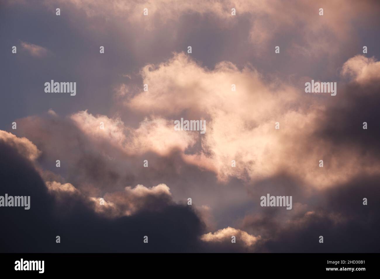 Close up frame of dramatic sunset clouds. Stock Photo