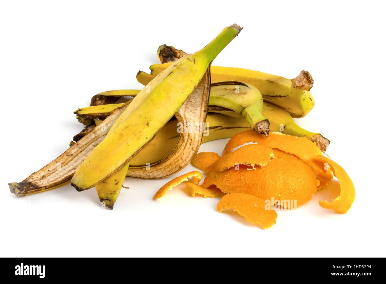 Fruit waste, banana peel and citrus isolated on white background Stock