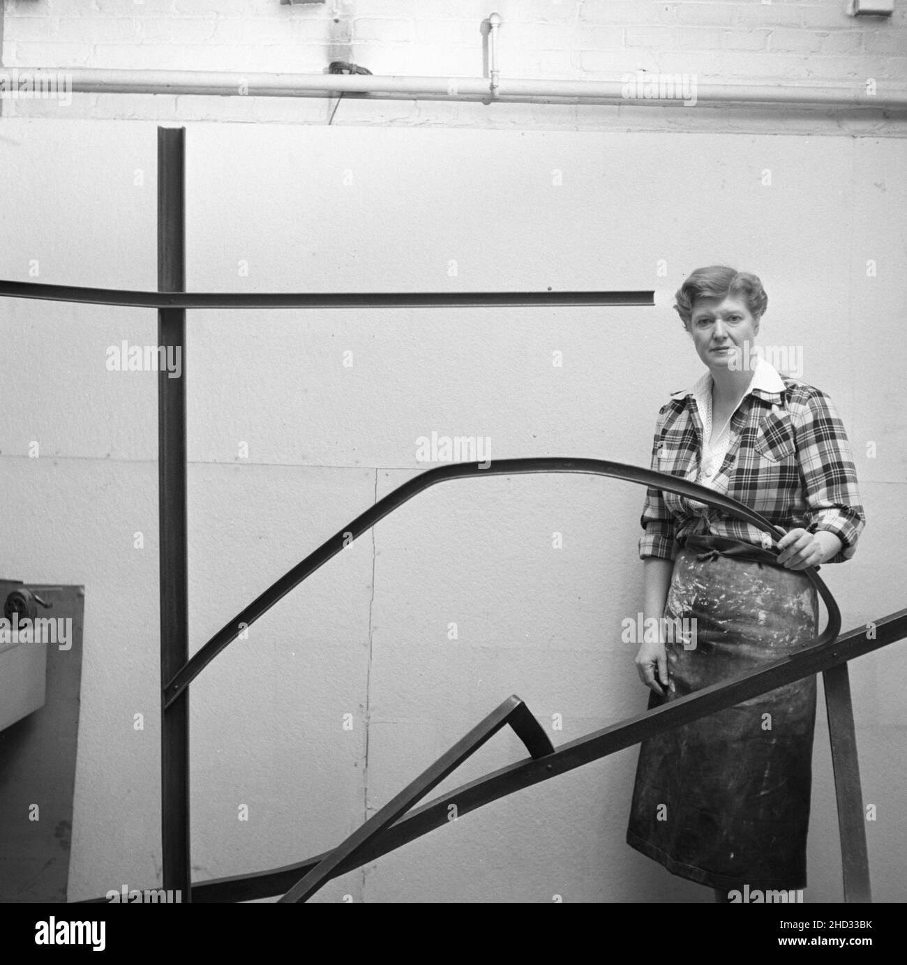 Mary Callery, sculptor, in her workshop, 1950. The exact date in unknown, but the year is 1950. The location is also unknown, though it is likely New York City. Stock Photo