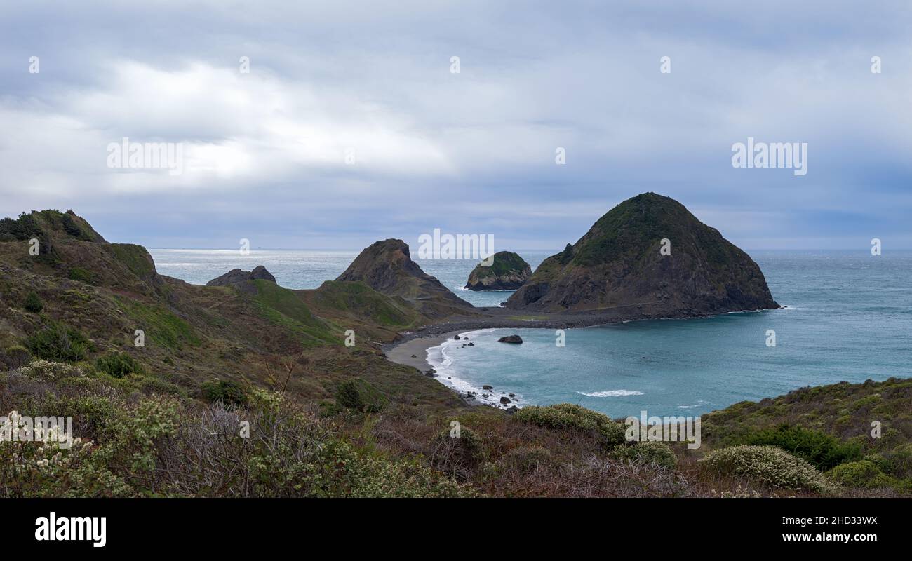 Panorama of sea stacks at Sisters Rock State Park on the Pacific coast ...