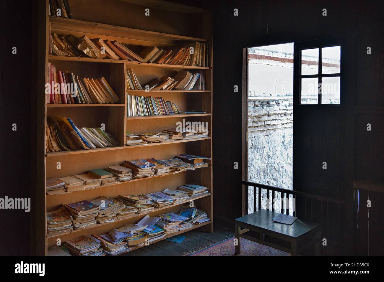 Old bookcase in an ancient monastery in Pindaya, Myanmar. Temples are centres for study and worship for the whole community. Often is possible to find Stock Photo