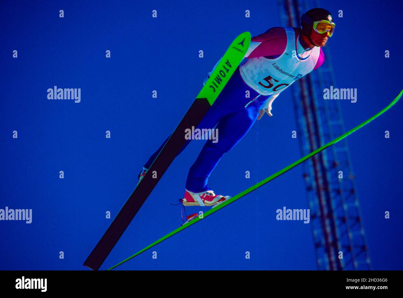 Ted Langlois (USA) competing in the Men's K120 individual ski jumping at the 1994 Olympic Winter Games Stock Photo